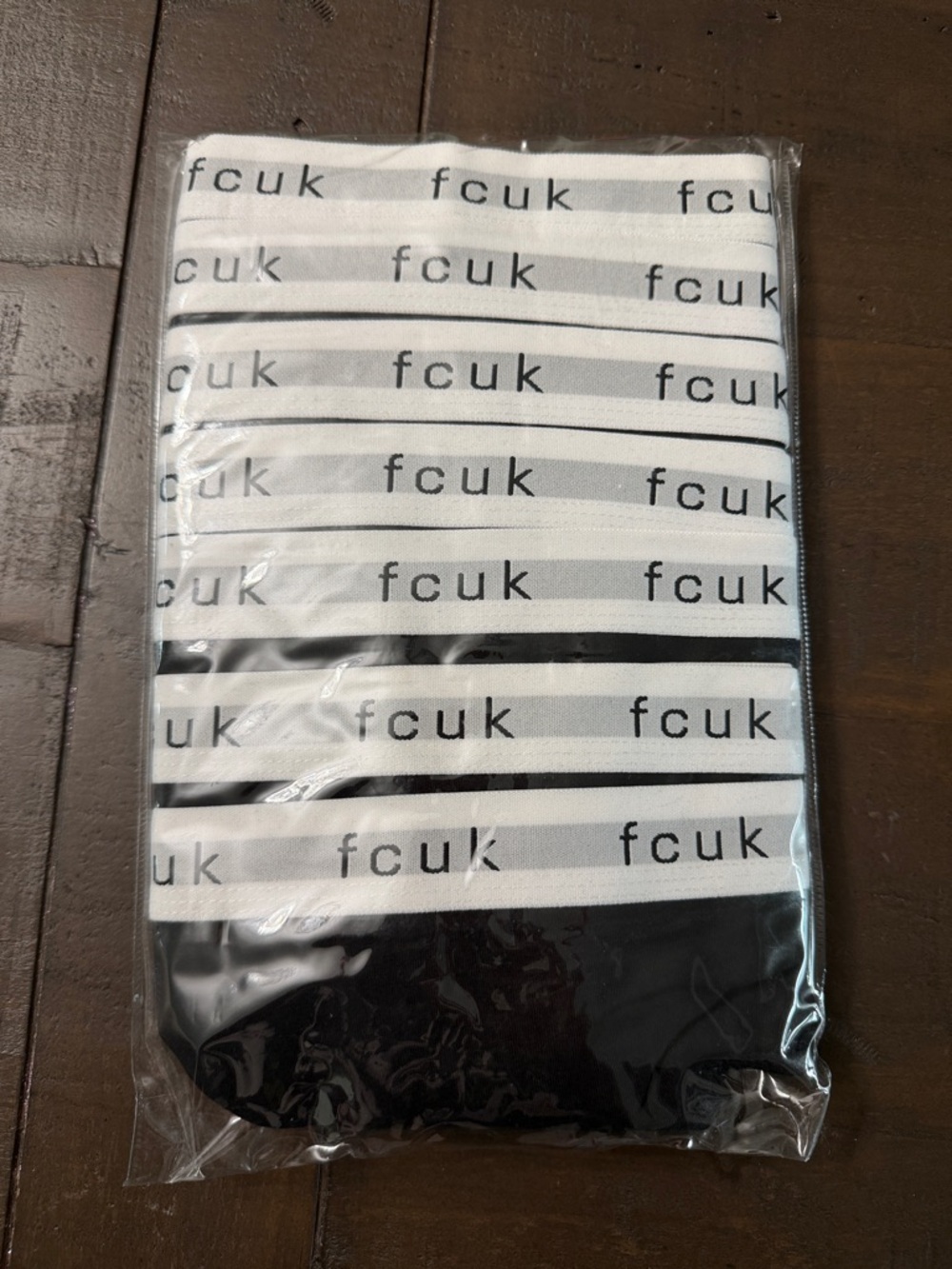 7 pack of French Connection White and Black Striped Logo Thongs